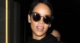 Rihanna wearing sunglasses at the airport