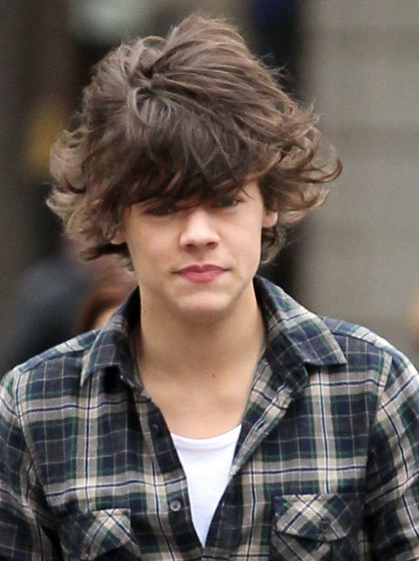 One Direction's Harry Styles Catches Wind Of The Cold Weather In London