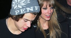 Harry Styles and Taylor Swift holding hands