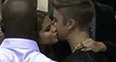 Justin Bieber and Selena Gomez kissing at Billboar