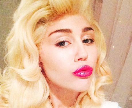 Miley Cyrus gets her long hair back for one night only with this fancy ...